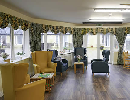 The conservatory room leading out on to the courtyard