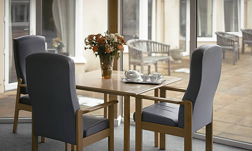 Seating area in the lounge with views to patio